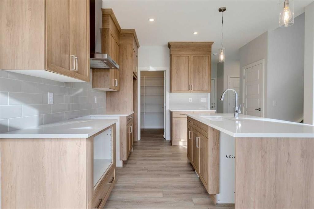 303 Dawson Dock Way, Chestermere, AB - Indoor Photo Showing Kitchen