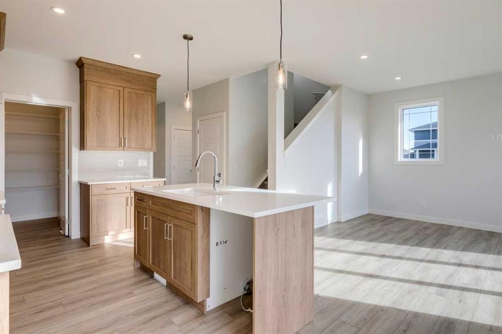 303 Dawson Dock Way, Chestermere, AB - Indoor Photo Showing Kitchen