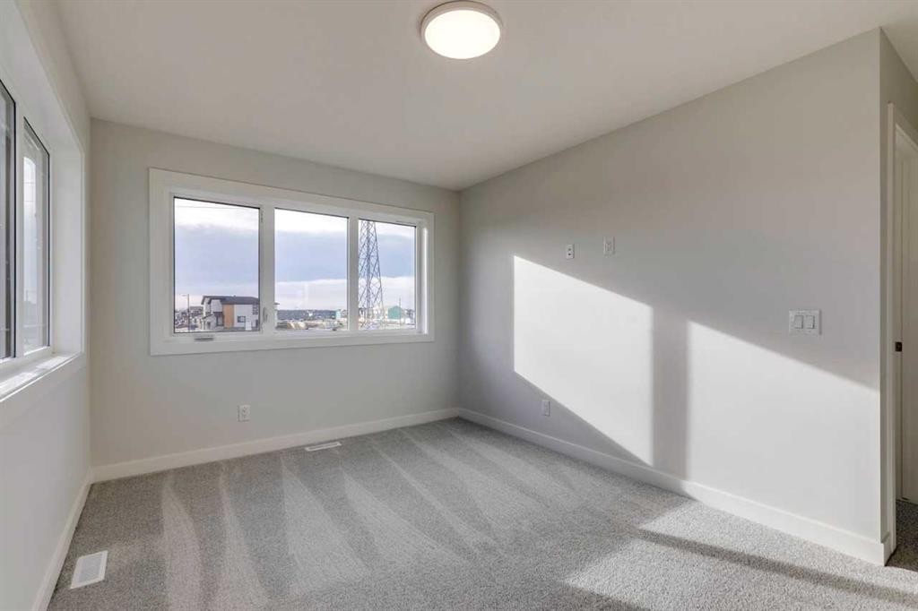 303 Dawson Dock Way, Chestermere, AB - Indoor Photo Showing Other Room