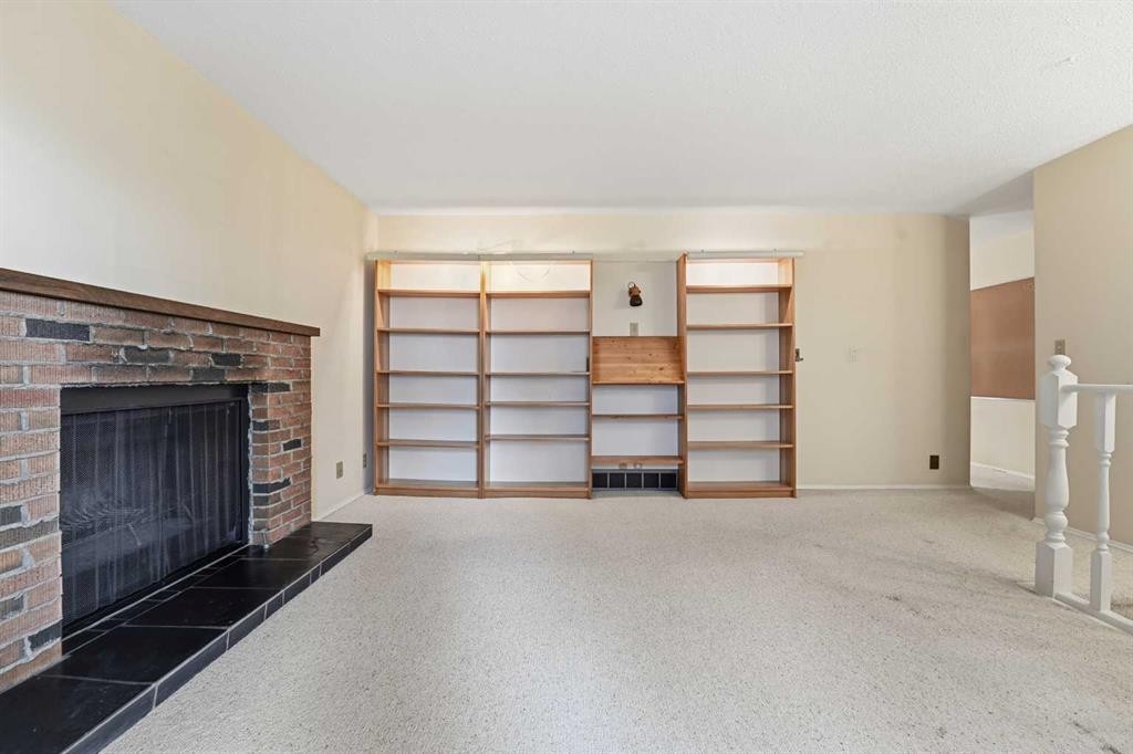 49 Pamely Avenue, Red Deer, AB - Indoor With Fireplace