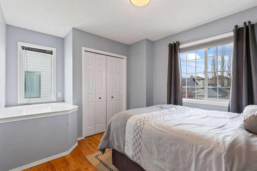 60 Bridlecreek Terrace Sw, Calgary, AB - Indoor Photo Showing Bedroom