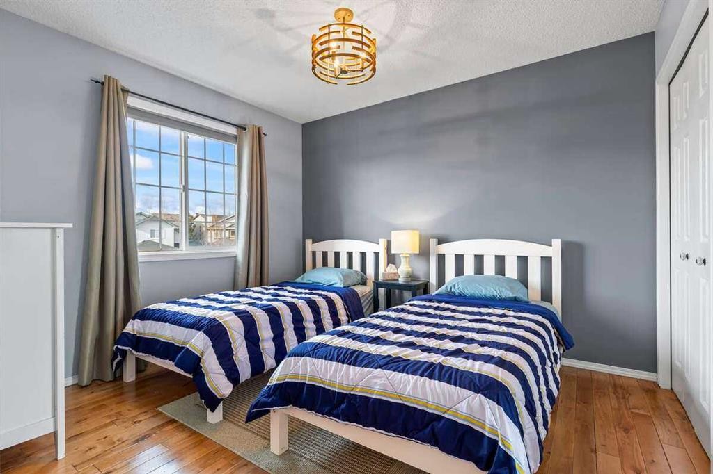 60 Bridlecreek Terrace Sw, Calgary, AB - Indoor Photo Showing Bedroom