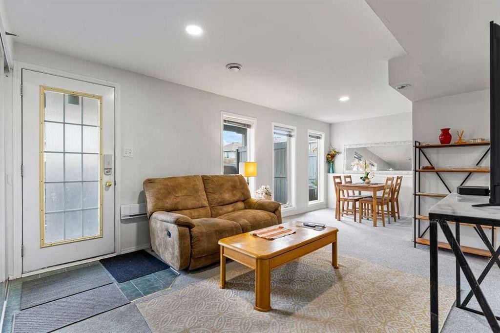 60 Bridlecreek Terrace Sw, Calgary, AB - Indoor Photo Showing Living Room