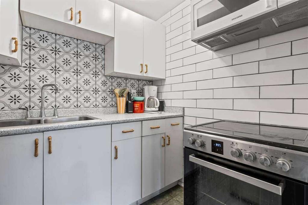 60 Bridlecreek Terrace Sw, Calgary, AB - Indoor Photo Showing Kitchen With Upgraded Kitchen