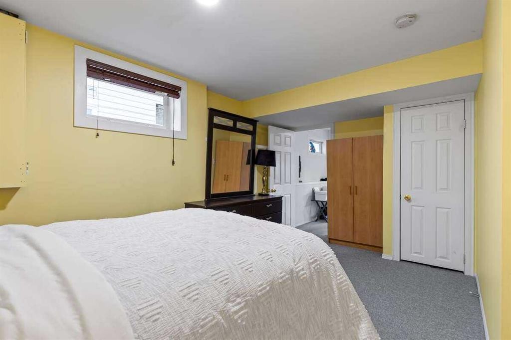60 Bridlecreek Terrace Sw, Calgary, AB - Indoor Photo Showing Bedroom