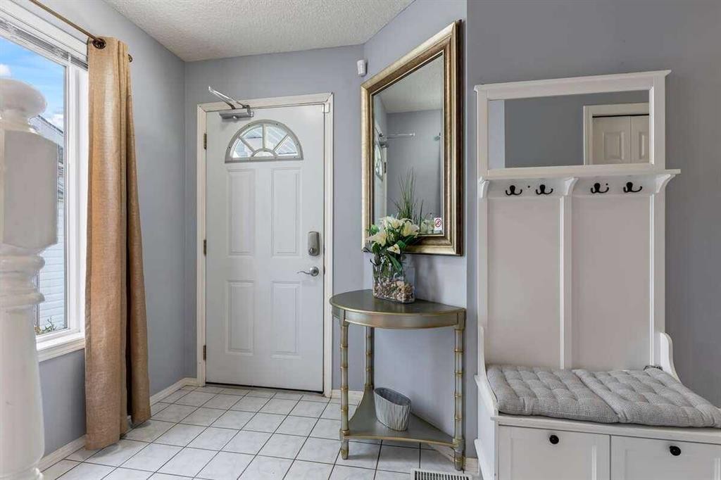 60 Bridlecreek Terrace Sw, Calgary, AB - Indoor Photo Showing Other Room