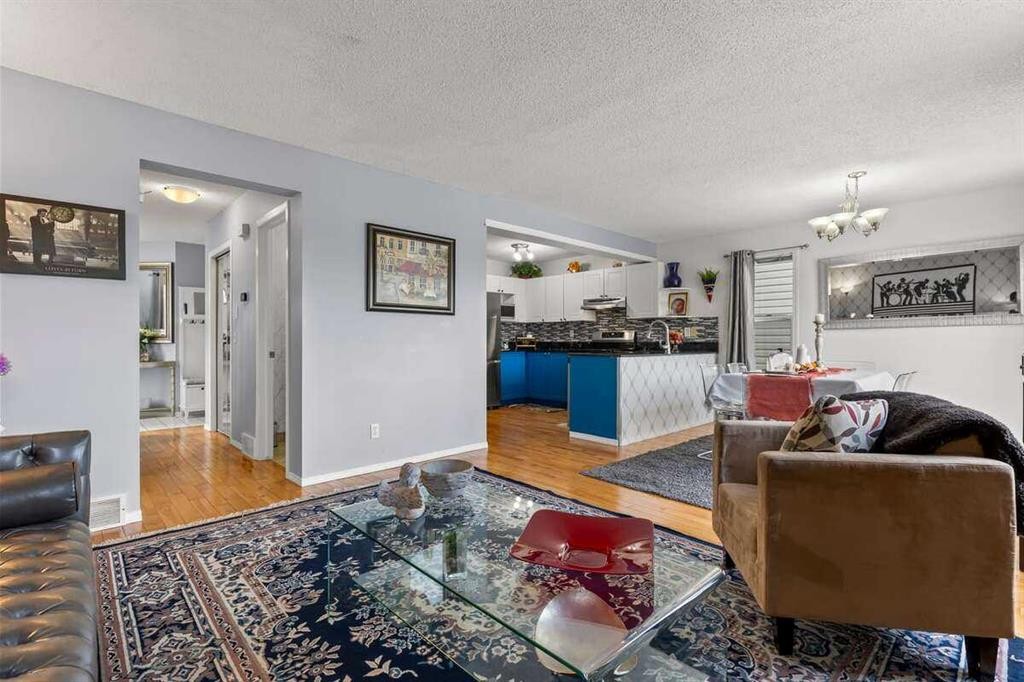 60 Bridlecreek Terrace Sw, Calgary, AB - Indoor Photo Showing Living Room