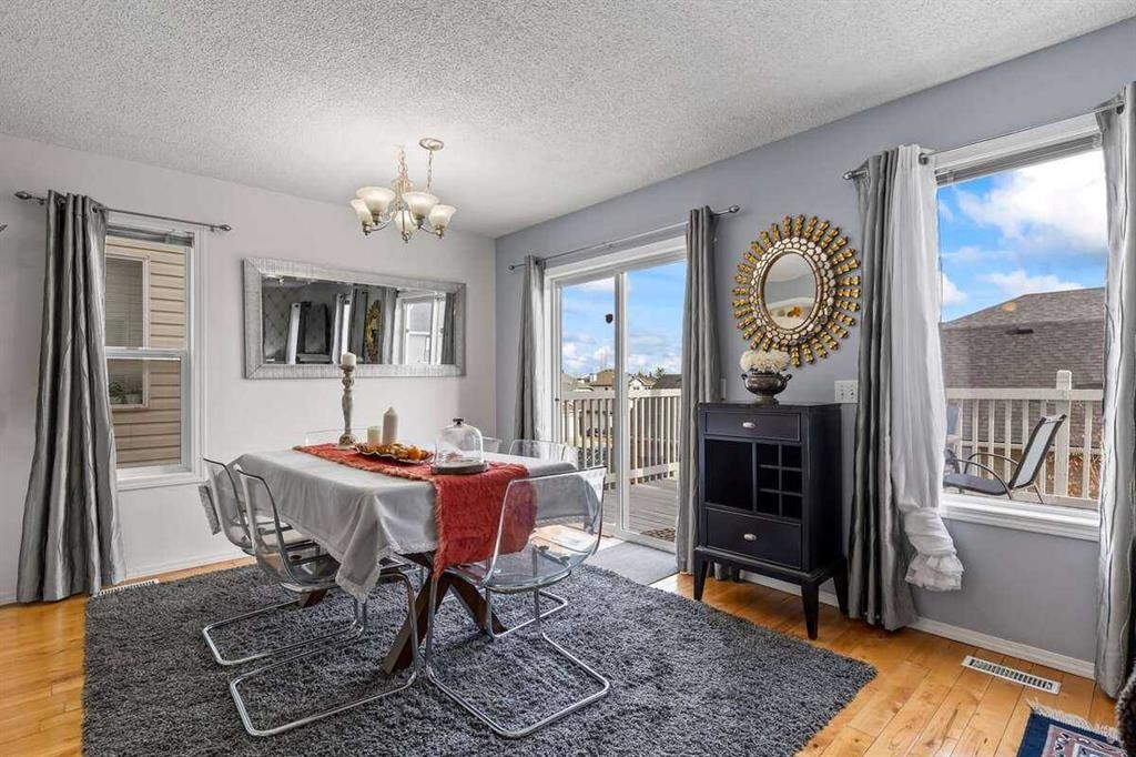 60 Bridlecreek Terrace Sw, Calgary, AB - Indoor Photo Showing Dining Room