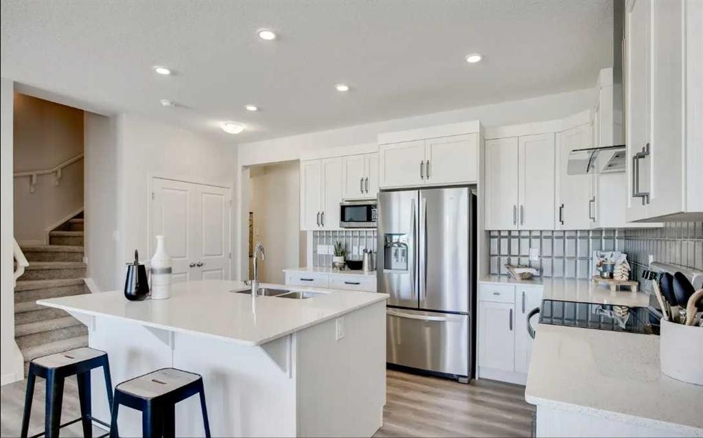 89 Creekstone Grove Sw, Calgary, AB - Indoor Photo Showing Kitchen With Double Sink With Upgraded Kitchen