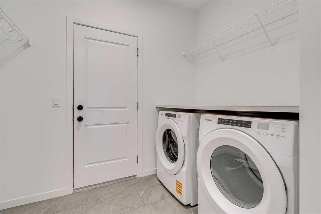 75 Fireside Common, Cochrane, AB - Indoor Photo Showing Laundry Room