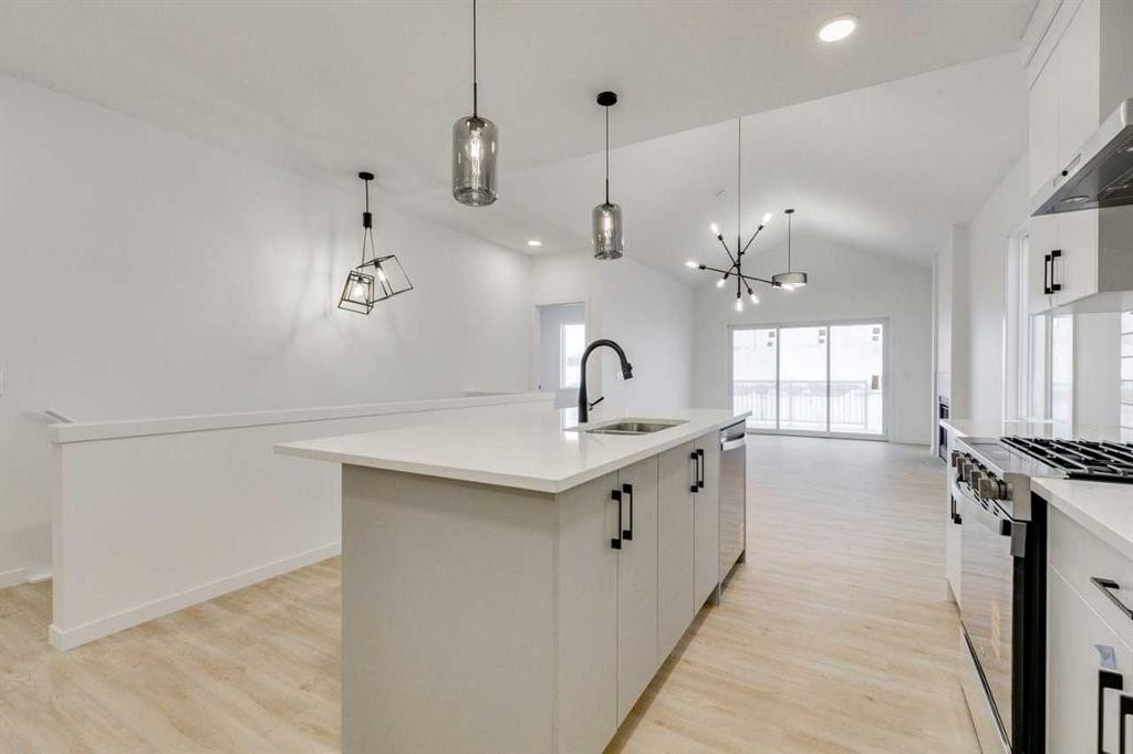 75 Fireside Common, Cochrane, AB - Indoor Photo Showing Kitchen With Upgraded Kitchen