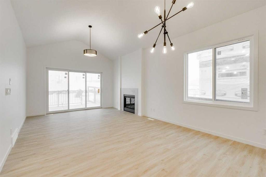 75 Fireside Common, Cochrane, AB - Indoor With Fireplace
