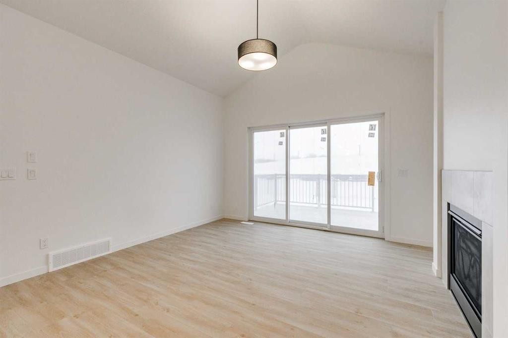 75 Fireside Common, Cochrane, AB - Indoor Photo Showing Other Room