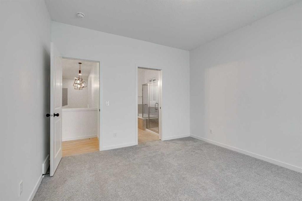 75 Fireside Common, Cochrane, AB - Indoor Photo Showing Other Room