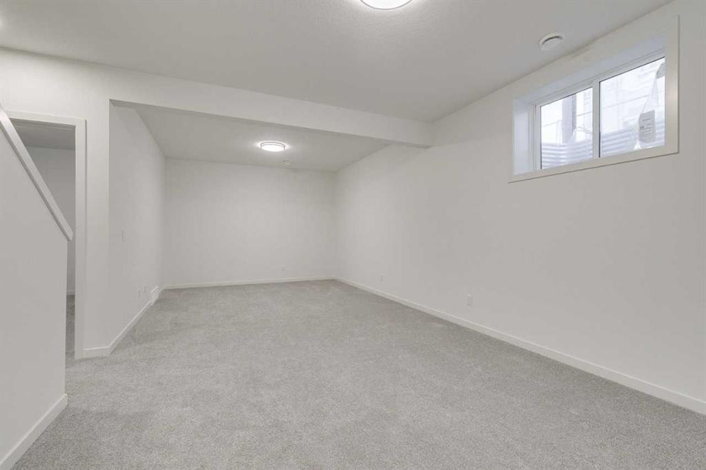 75 Fireside Common, Cochrane, AB - Indoor Photo Showing Other Room