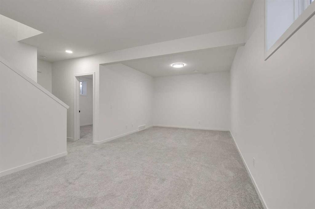 75 Fireside Common, Cochrane, AB - Indoor Photo Showing Other Room