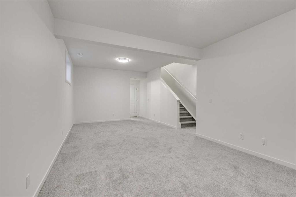 75 Fireside Common, Cochrane, AB - Indoor Photo Showing Other Room