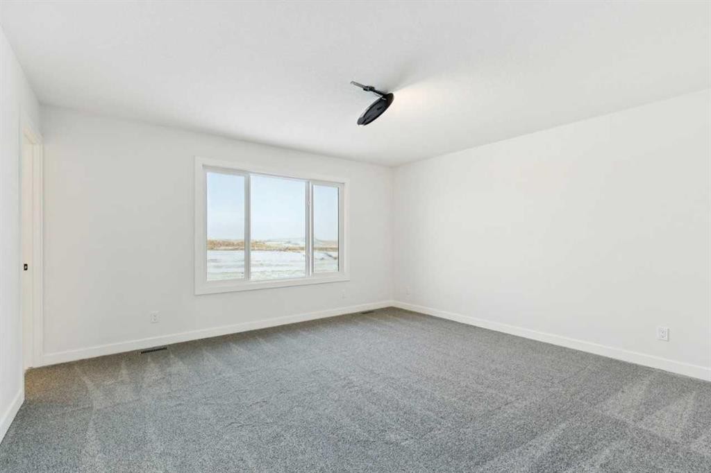 199 Langwell Common Se, Airdrie, AB - Indoor Photo Showing Other Room