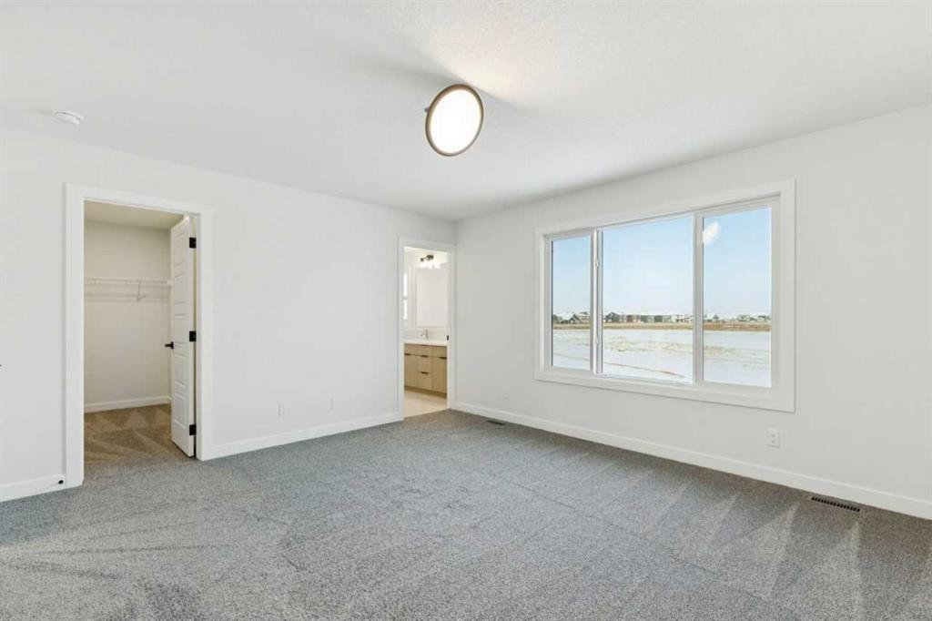 199 Langwell Common Se, Airdrie, AB - Indoor Photo Showing Other Room