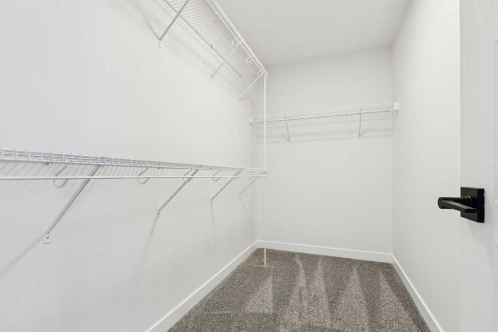 199 Langwell Common Se, Airdrie, AB - Indoor With Storage