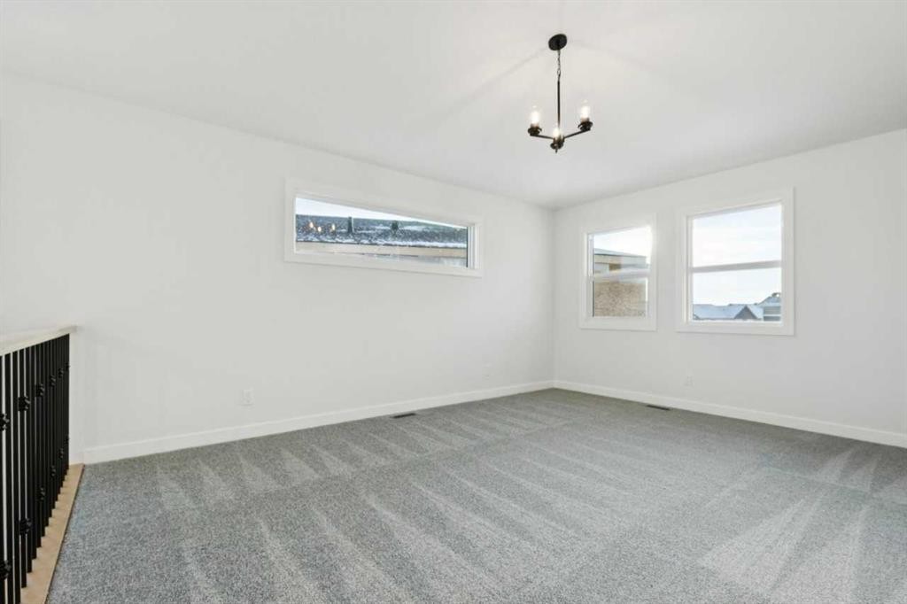 199 Langwell Common Se, Airdrie, AB - Indoor Photo Showing Other Room