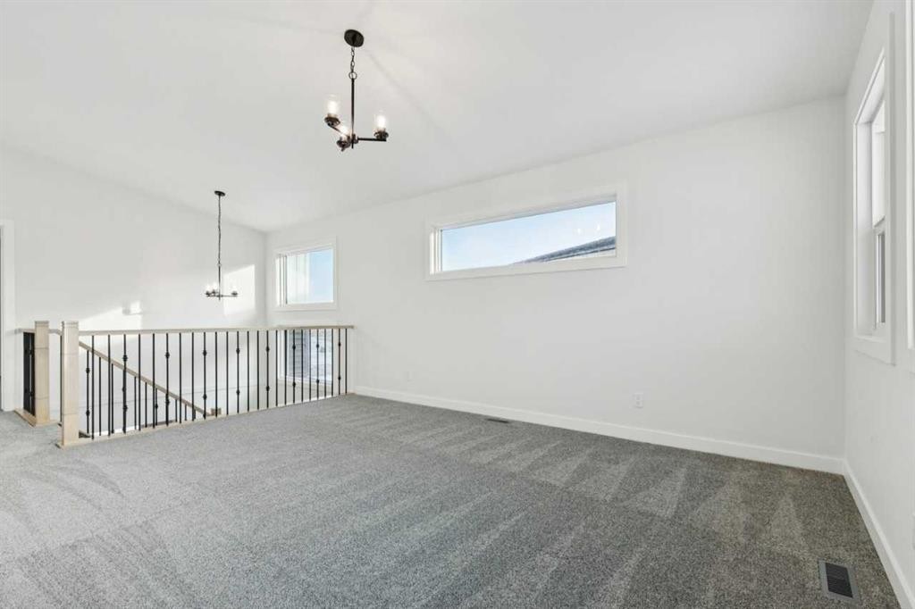 199 Langwell Common Se, Airdrie, AB - Indoor Photo Showing Other Room