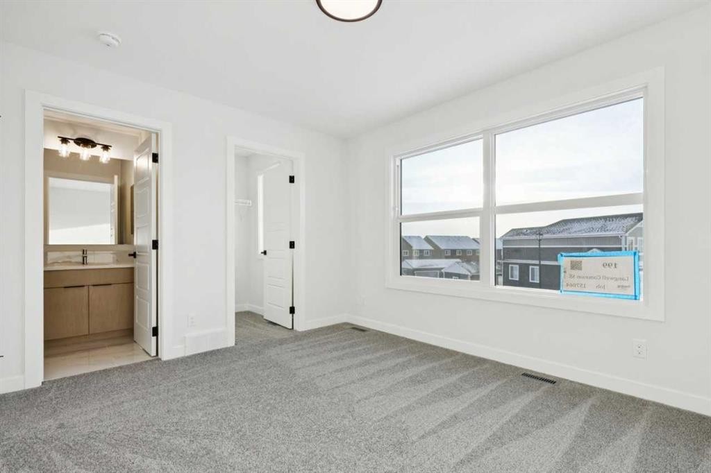 199 Langwell Common Se, Airdrie, AB - Indoor Photo Showing Other Room