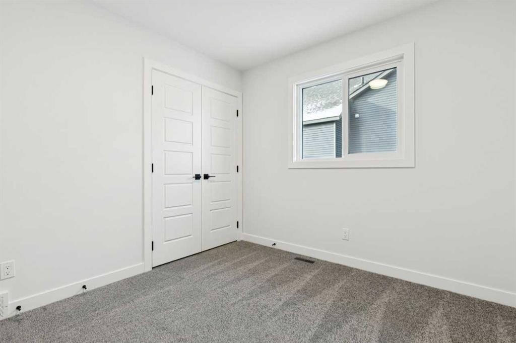 199 Langwell Common Se, Airdrie, AB - Indoor Photo Showing Other Room