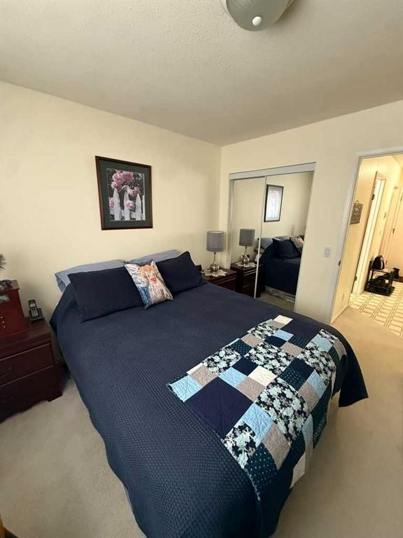 201-5519 Kerry Wood Drive, Red Deer, AB - Indoor Photo Showing Bedroom