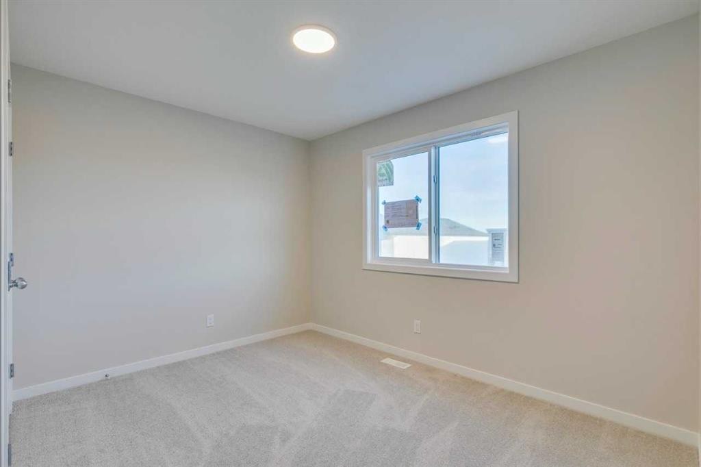 82 Alpine Common Sw, Calgary, AB - Indoor Photo Showing Other Room