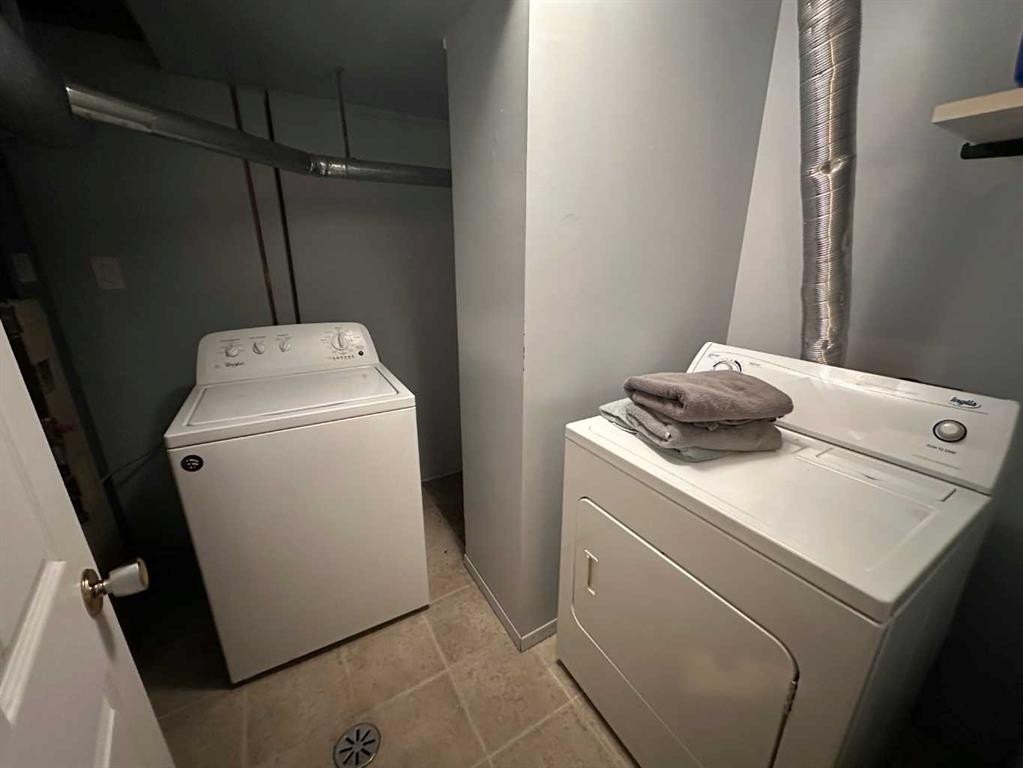 A & B-4923 53 Street, Rocky Mountain House, AB - Indoor Photo Showing Laundry Room