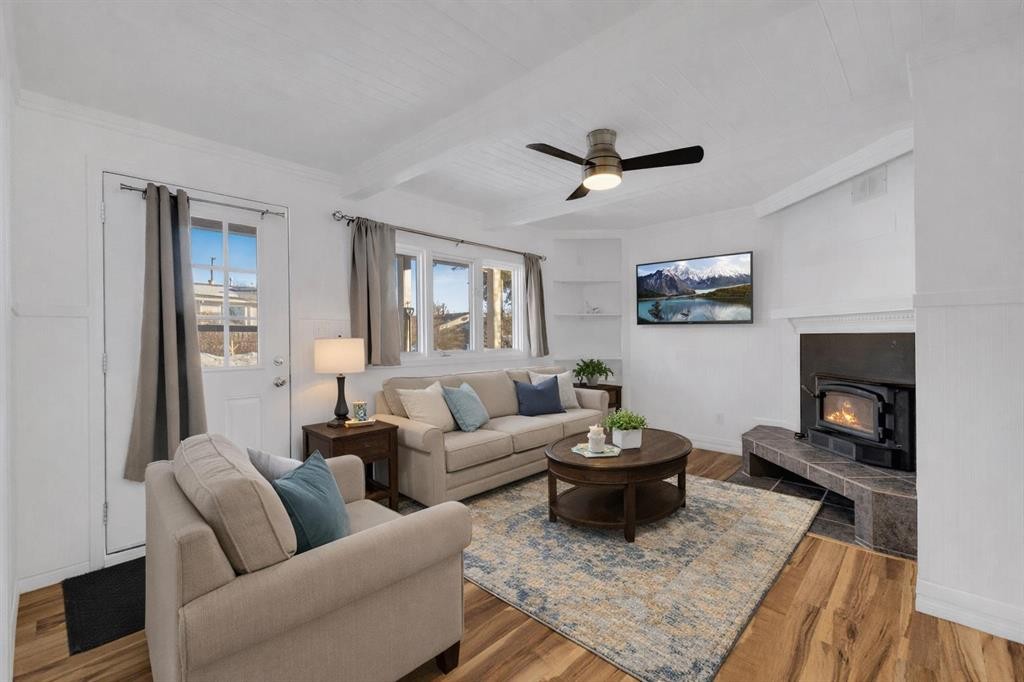 2014 24 Avenue, Delburne, AB - Indoor Photo Showing Living Room With Fireplace