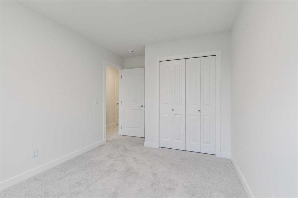 221 Bridgeport Gate Sw, Chestermere, AB - Indoor Photo Showing Other Room