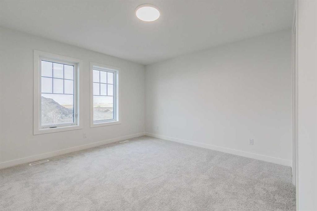 221 Bridgeport Gate Sw, Chestermere, AB - Indoor Photo Showing Other Room