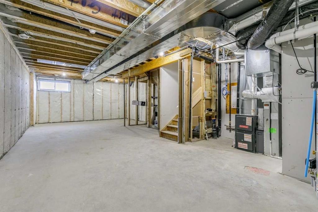 221 Bridgeport Gate Sw, Chestermere, AB - Indoor Photo Showing Basement