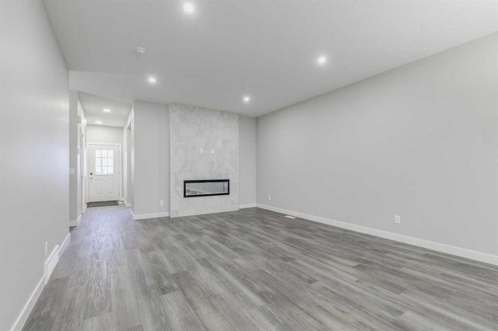 197 Bridgeport Gate, Chestermere, AB - Indoor Photo Showing Other Room