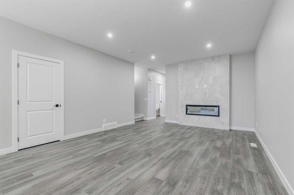 197 Bridgeport Gate, Chestermere, AB - Indoor Photo Showing Other Room