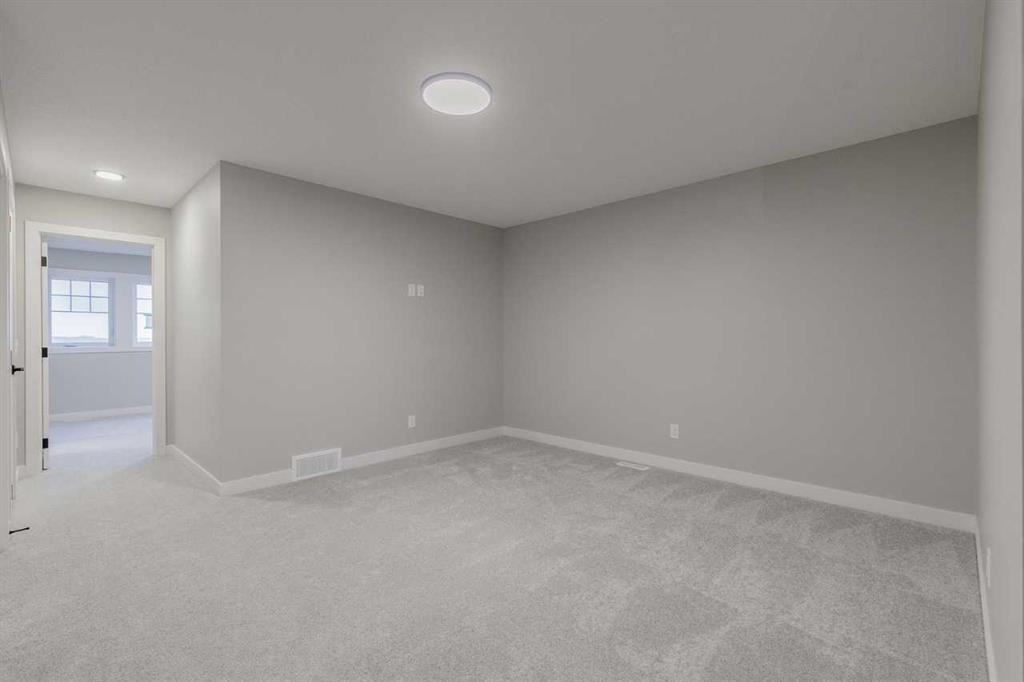 197 Bridgeport Gate, Chestermere, AB - Indoor Photo Showing Other Room