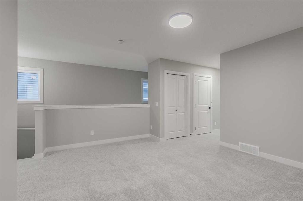 197 Bridgeport Gate, Chestermere, AB - Indoor Photo Showing Other Room