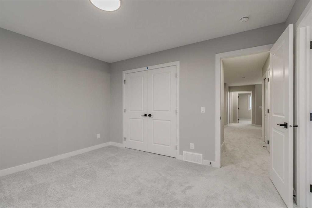 197 Bridgeport Gate, Chestermere, AB - Indoor Photo Showing Other Room