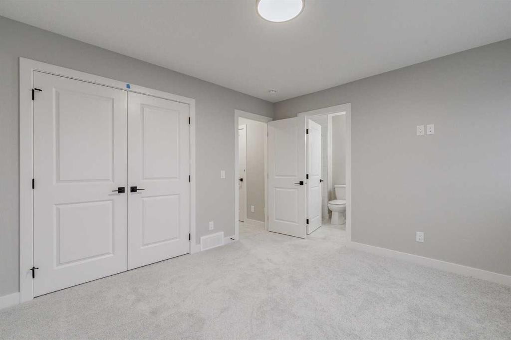 197 Bridgeport Gate, Chestermere, AB - Indoor Photo Showing Other Room