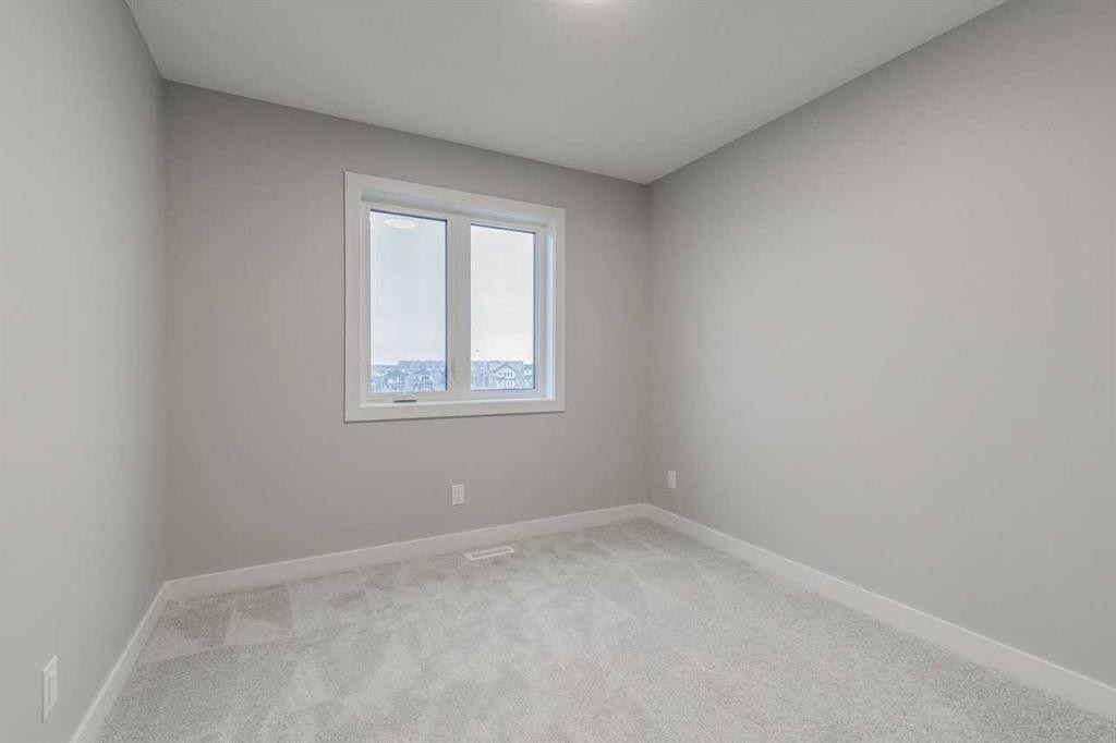 197 Bridgeport Gate, Chestermere, AB - Indoor Photo Showing Other Room