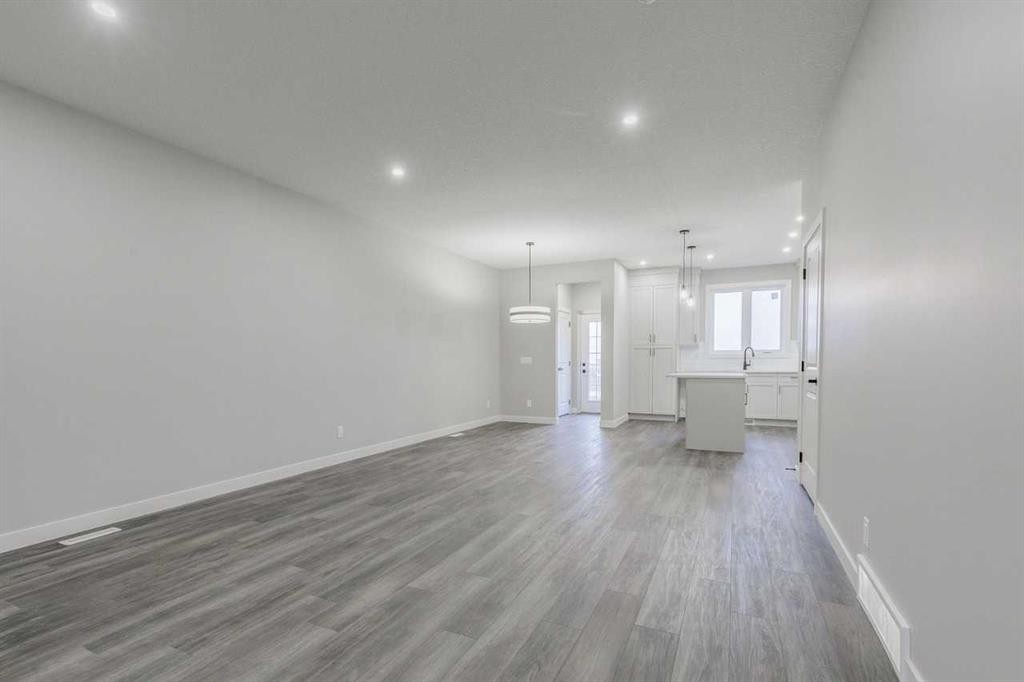 197 Bridgeport Gate, Chestermere, AB - Indoor Photo Showing Other Room