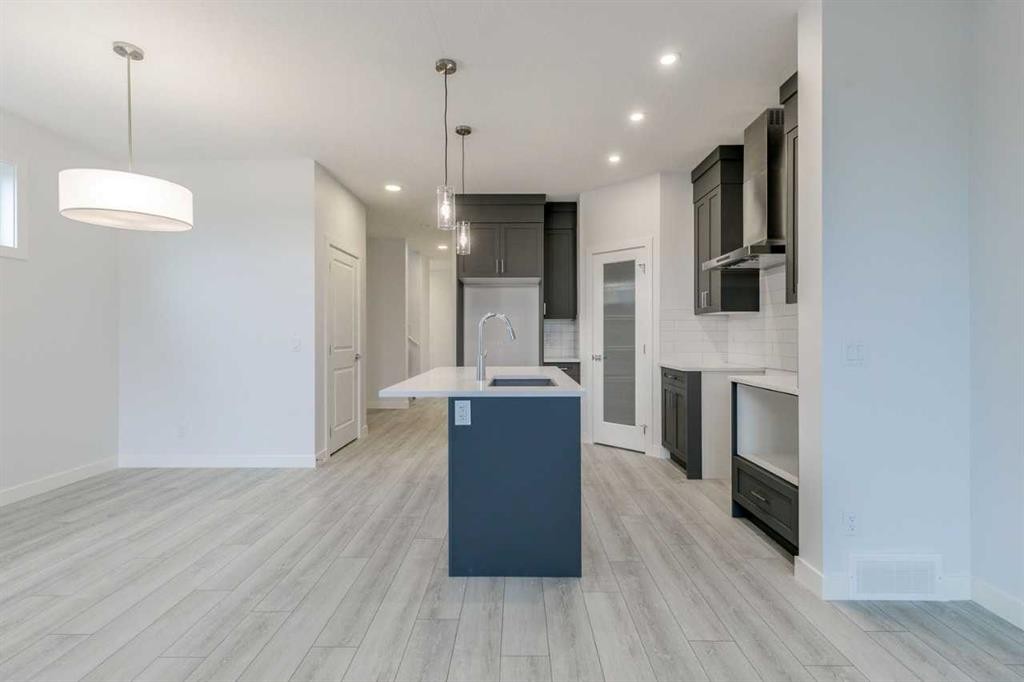 205 Bridgeport Gate, Chestermere, AB - Indoor Photo Showing Kitchen