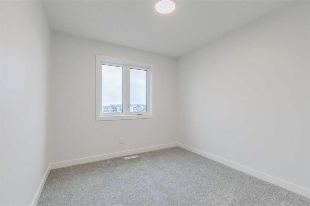 205 Bridgeport Gate, Chestermere, AB - Indoor Photo Showing Other Room