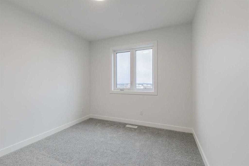 205 Bridgeport Gate, Chestermere, AB - Indoor Photo Showing Other Room