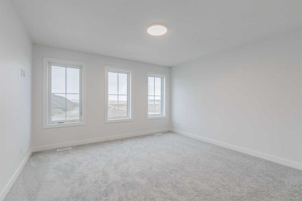 205 Bridgeport Gate, Chestermere, AB - Indoor Photo Showing Other Room