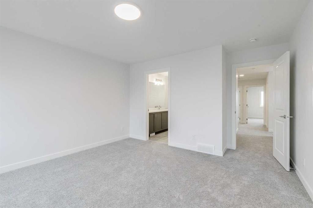 205 Bridgeport Gate, Chestermere, AB - Indoor Photo Showing Other Room