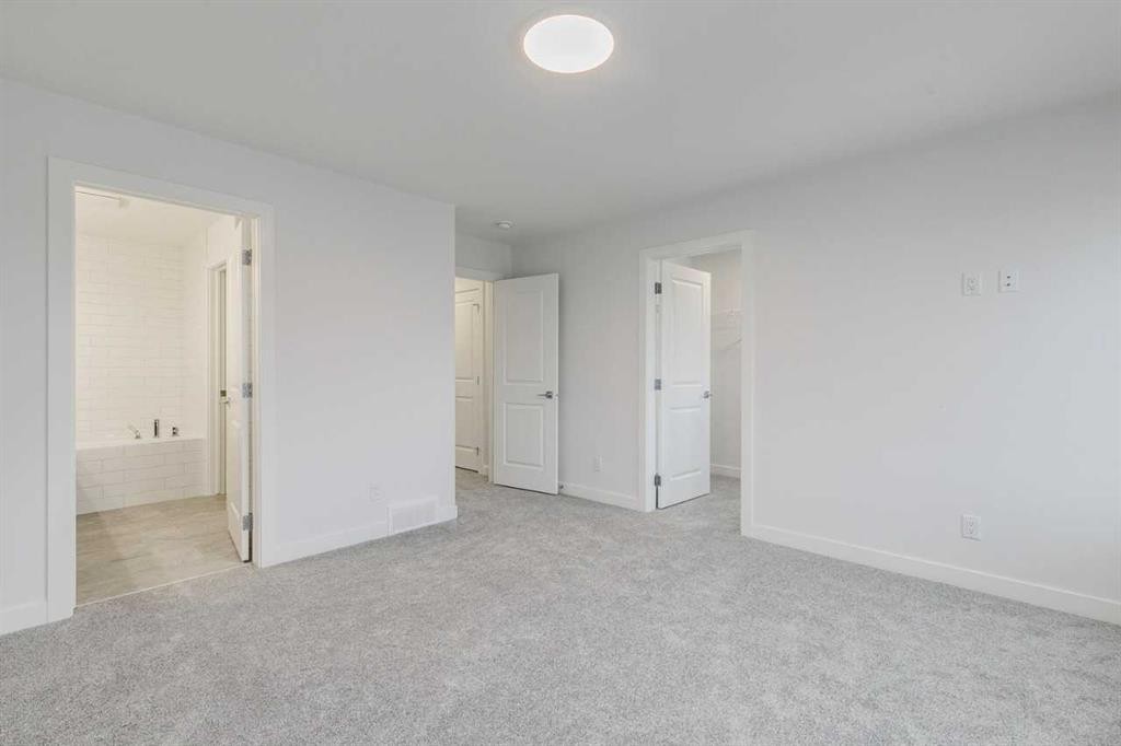 205 Bridgeport Gate, Chestermere, AB - Indoor Photo Showing Other Room