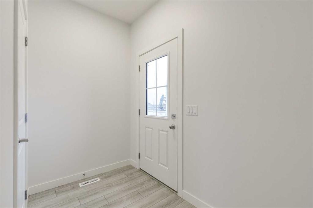 205 Bridgeport Gate, Chestermere, AB - Indoor Photo Showing Other Room